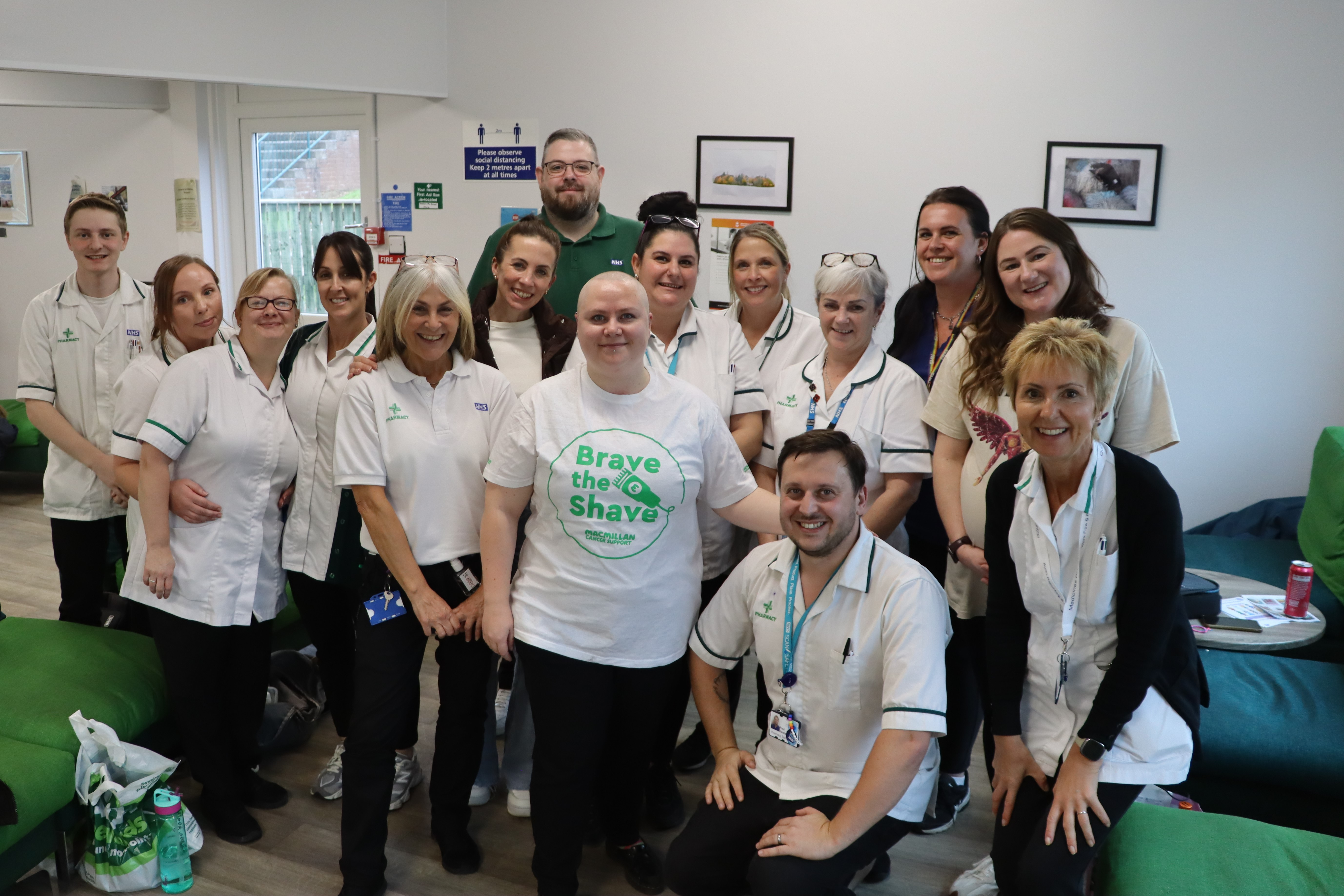 Pharmacy technician shaves blue hair for cancer